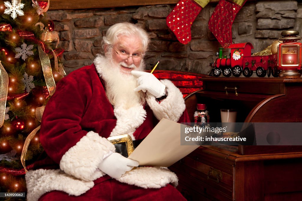 Fotografias do Real Pai Natal fazendo sua provocadora nice lista