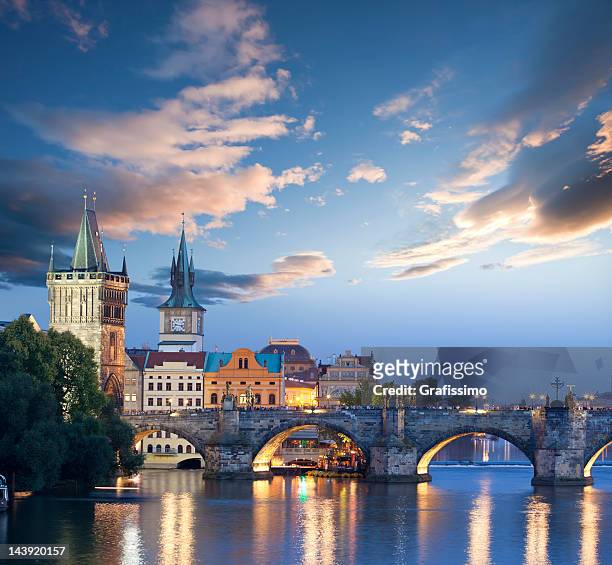 czech republic prague charles bridge at dawn - prague stock pictures, royalty-free photos & images