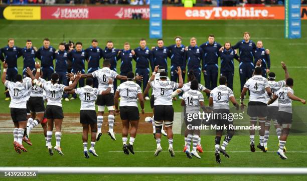 Fiji players perform the Cibi in front of the Scotland team during the Autumn International match between Scotland and Fiji at Murrayfield Stadium on...