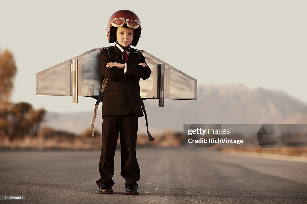 Young Business Boy with Arms Crossed Wearing Jet Pack