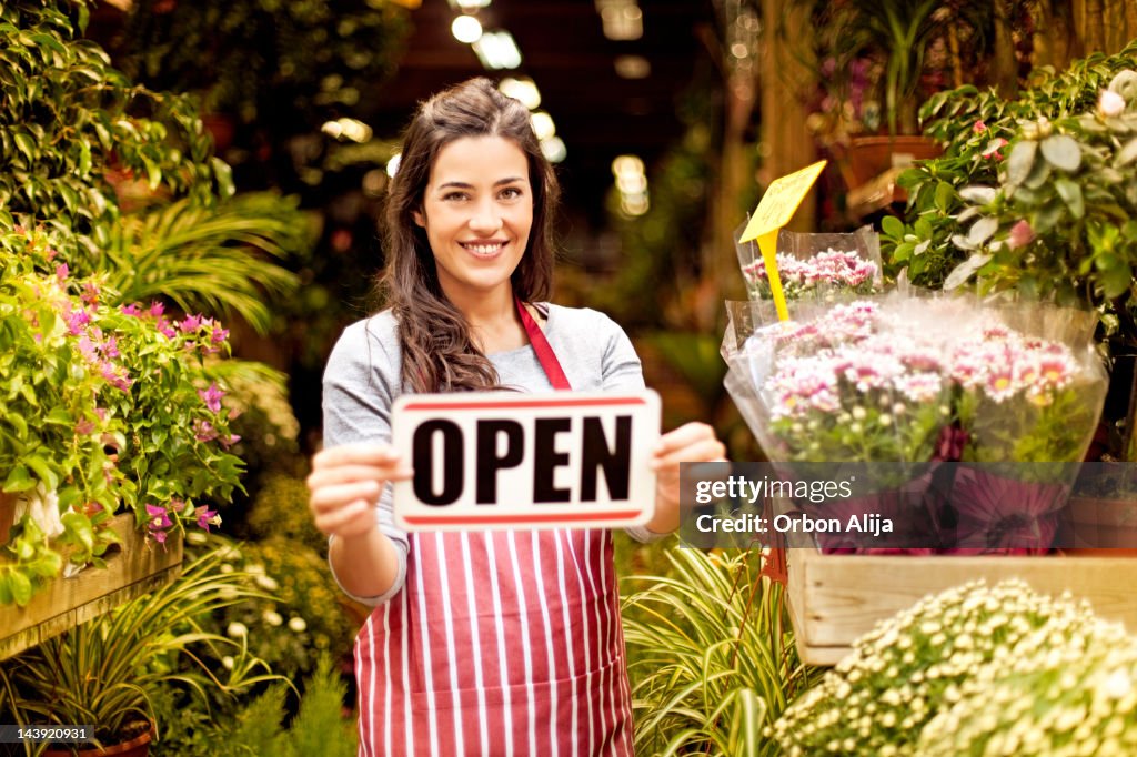 Woman working in plant shop