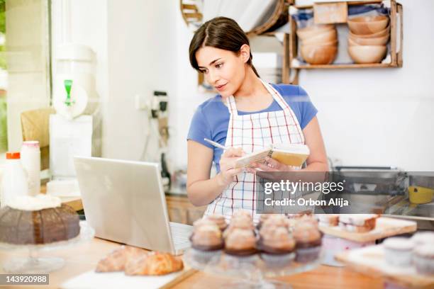 cupcakes store planning - bakery apron stock pictures, royalty-free photos & images