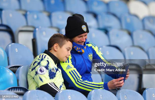 Fan checks their phone outside the stadium prior to the Premier League match between Leeds United and AFC Bournemouth at Elland Road on November 05,...