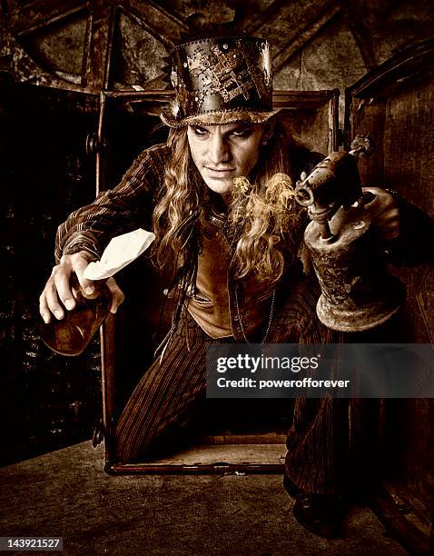 steampunk man with molotov cocktail - steampunk decor stock pictures, royalty-free photos & images