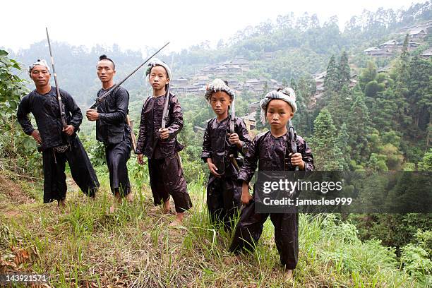 arrogant gunners - hmong village stock pictures, royalty-free photos & images