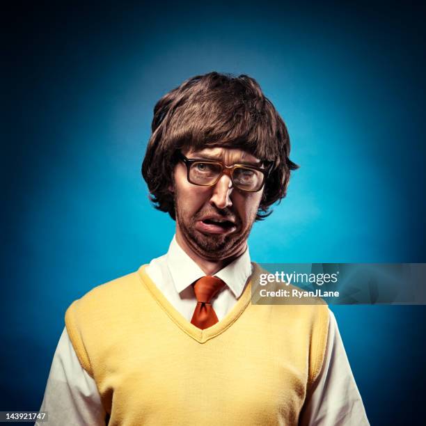 crabby nerd student making a pouting face - thick rimmed spectacles stock pictures, royalty-free photos & images