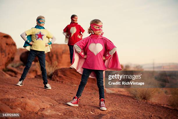 super sisters - superhero kid stockfoto's en -beelden