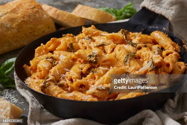 creamy tomato pasta - tomato pasta stock pictures, royalty-free photos & images
