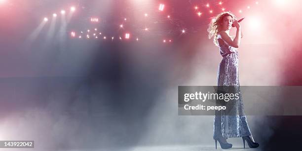 singer live on stage - glamour stock pictures, royalty-free photos & images