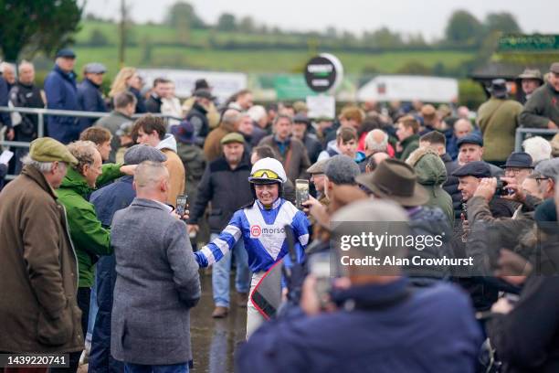 Bryony Frost makes her way back to the weighing room after riding Frodon to win The 61st Badger Beer Handicap Chase at Wincanton Racecourse on...