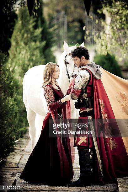 farewell between medieval knight and princess - period costume stock pictures, royalty-free photos & images