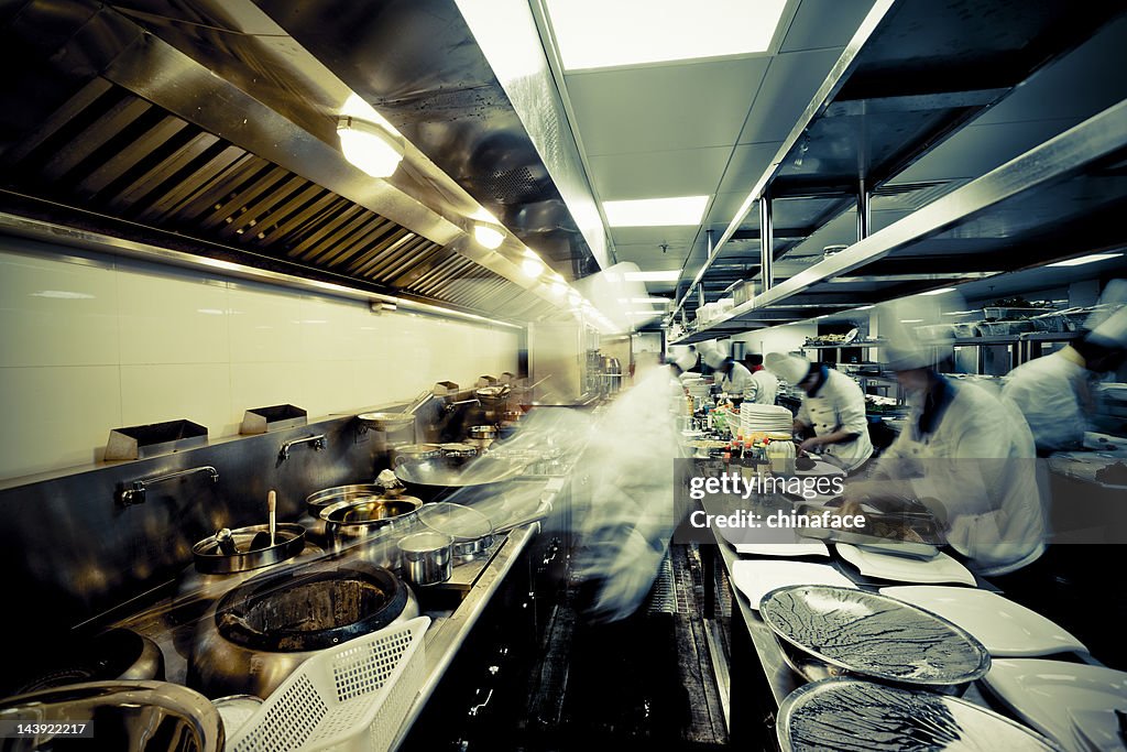 Motion chefs  of a restaurant kitchen