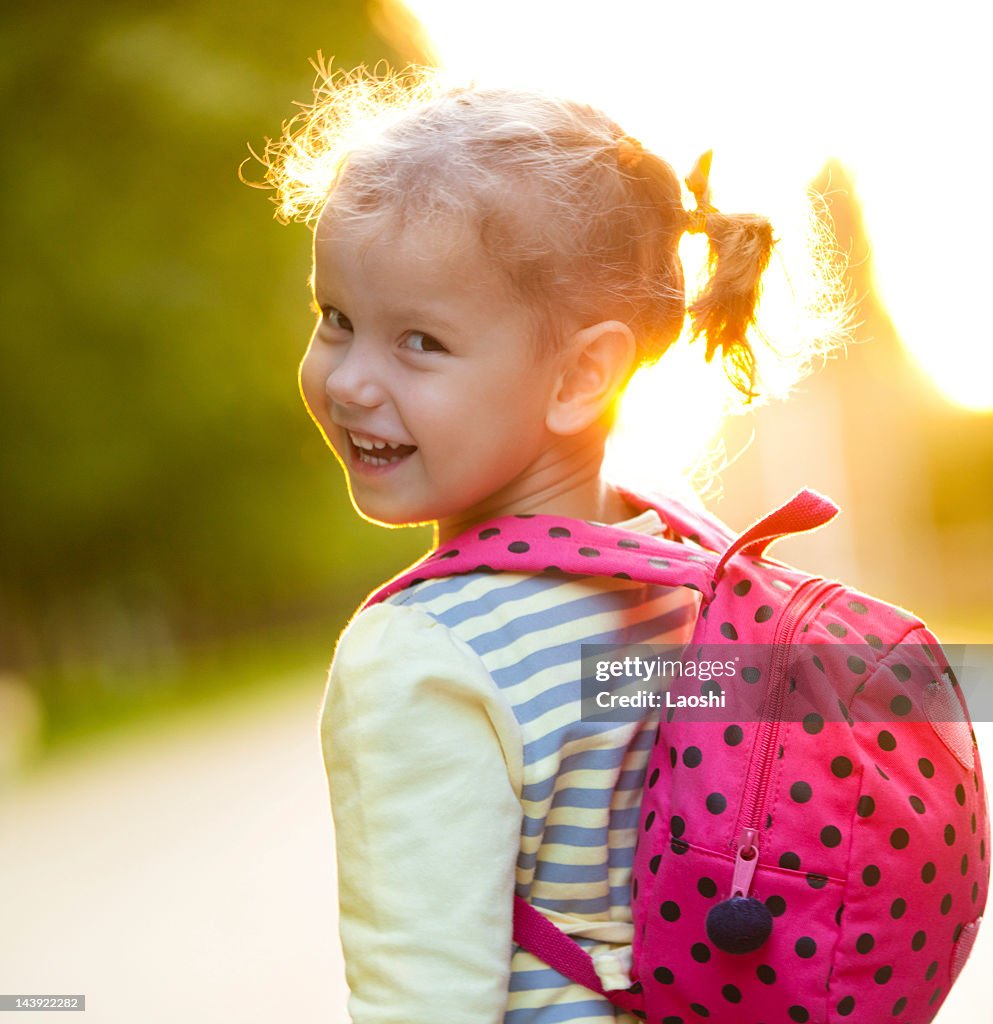 Girl with backpack