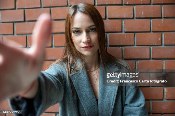 sade woman take a selfie - zoom fatigue stock pictures, royalty-free photos & images