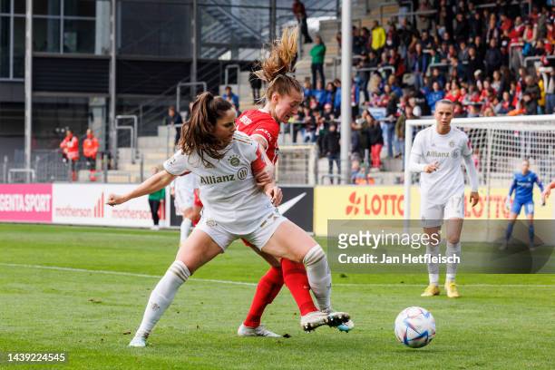 Janina Minge of SC Freiburg and Victoria Ezebinyou of SC Freiburg fight for the ball during the FLYERALARM Woman-Bundesliga match between SC Freiburg...