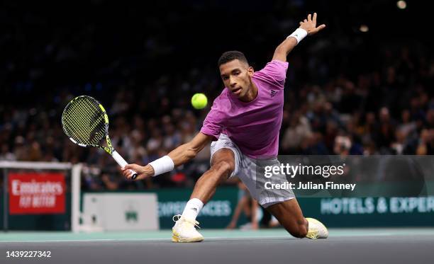 Felix Auger-Aliassime of Canada in action in his match against Holger Rune of Denmark in the semi finals during Day Six of the Rolex Paris Masters...