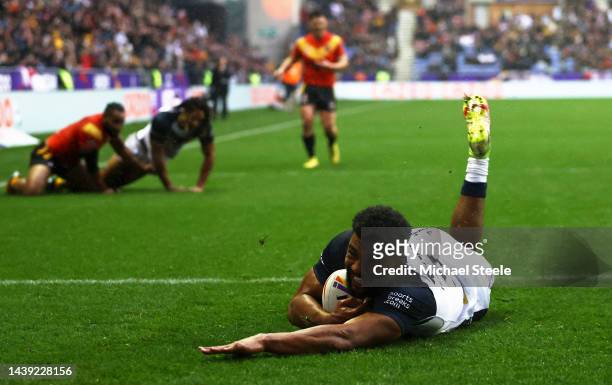 Kallum Watkins of England goes over to score their sides six try during Rugby League World Cup Quarter Final match between England and Papua New...