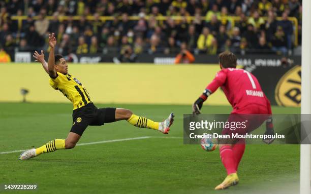 Jude Bellingham of Dortmund trys a shot on goal during the Bundesliga match between Borussia Dortmund and VfL Bochum 1848 at Signal Iduna Park on...