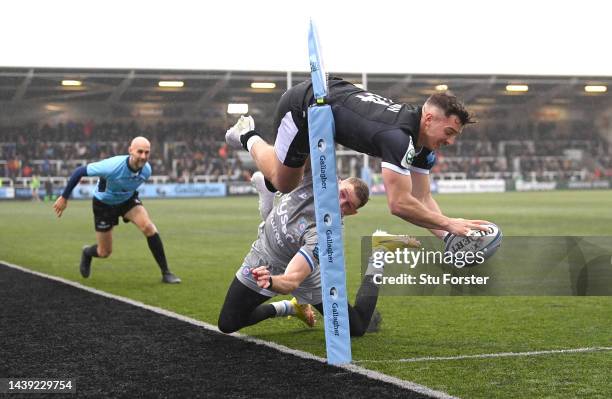 Falcons wing Adam Radwan dives over to score the opening try during the Gallagher Premiership Rugby match between Newcastle Falcons and Bath Rugby at...