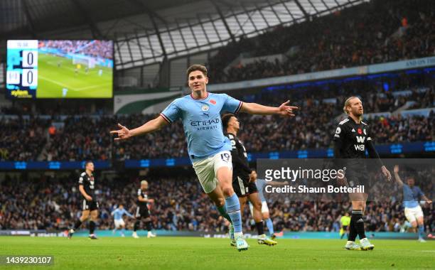 Julian Alvarez of Manchester City celebrates after scoring their team's first goal during the Premier League match between Manchester City and Fulham...