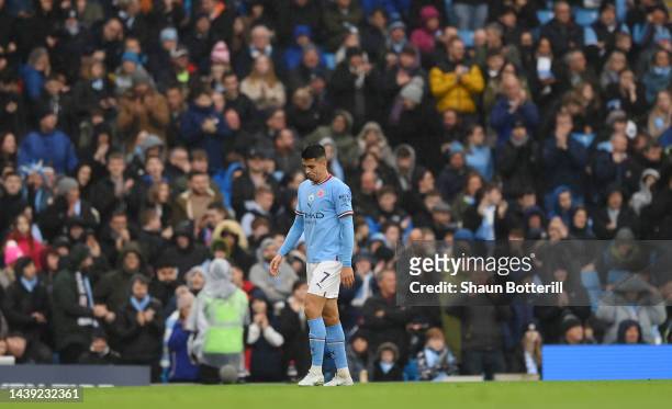 Joao Cancelo of Manchester City leaves the pitch after being red carded during the Premier League match between Manchester City and Fulham FC at...