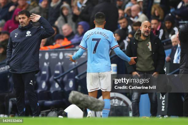 Joao Cancelo of Manchester City leaves the pitch after being red carded during the Premier League match between Manchester City and Fulham FC at...