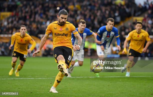 Ruben Neves of Wolverhampton Wanderers scores their team's second goal during the Premier League match between Wolverhampton Wanderers and Brighton &...
