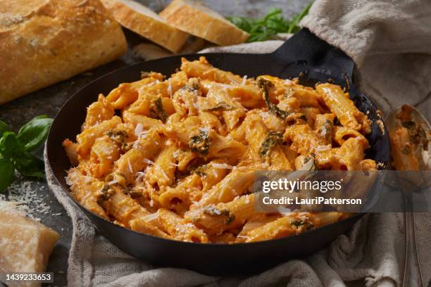 creamy tomato pasta - macaroni stock pictures, royalty-free photos & images