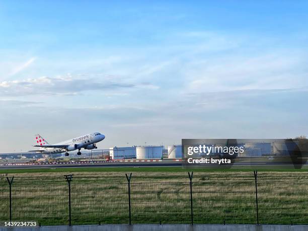 airplane from brussels airlines airborne - flanders belgium stock pictures, royalty-free photos & images