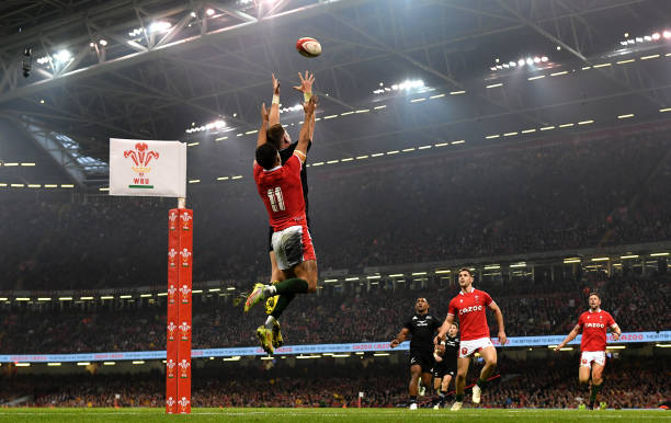 Jordie Barrett of New Zealand beats Rio Dyer of Wales to the high ball on the way to scoring his sides third try during the Autumn International match between Wales and New Zealand at Principality Stadium on November 05, 2022 in Cardiff, Wales.