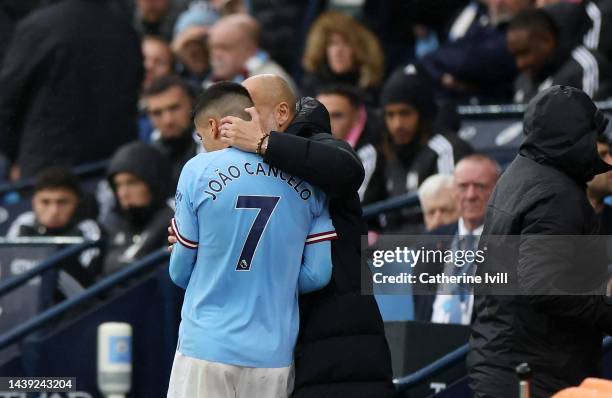 Joao Cancelo of Manchester City leaves the pitch after being red carded during the Premier League match between Manchester City and Fulham FC at...