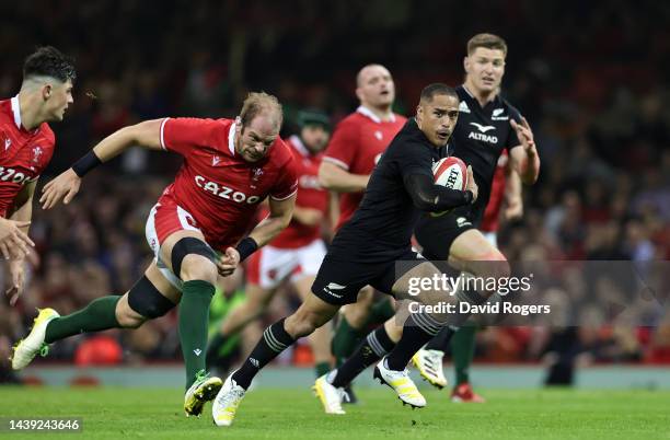 Aaron Smith of New Zealand breaks ckear tor score their fouth try during the Autumn International match between Wales and New Zealand All Blacks at...