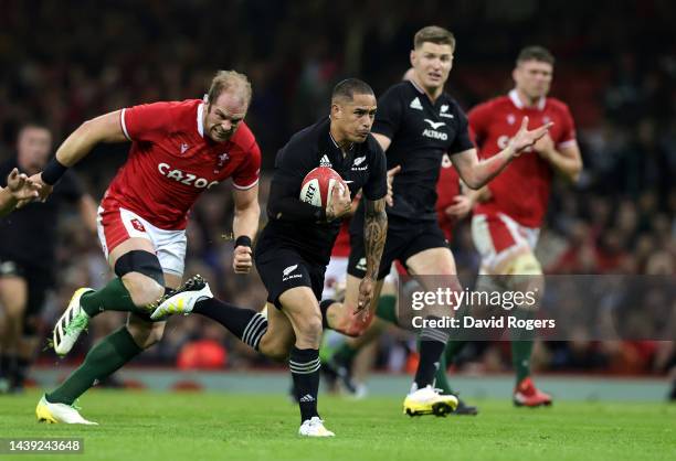 Aaron Smith of New Zealand breaks ckear tor score their fouth try during the Autumn International match between Wales and New Zealand All Blacks at...