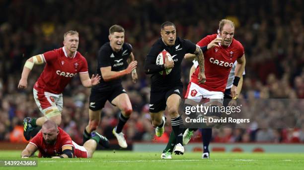 Aaron Smith of New Zealand breaks ckear tor score their fouth try during the Autumn International match between Wales and New Zealand All Blacks at...
