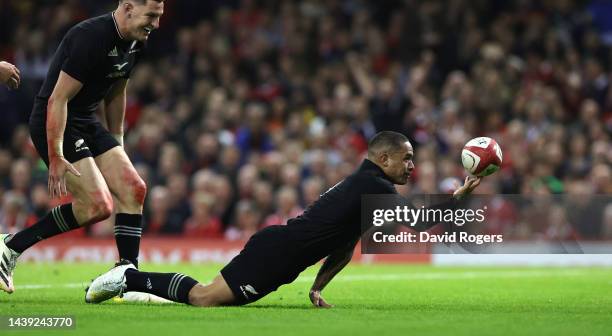 Aaron Smith of New Zealand celebrates after scoring their fouth try during the Autumn International match between Wales and New Zealand All Blacks at...