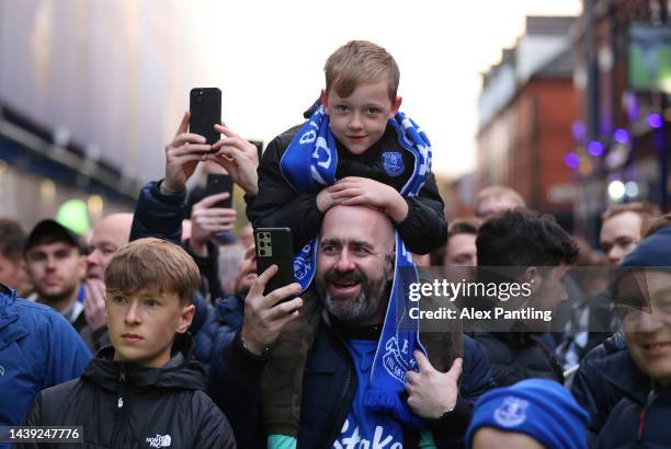 Everton fans arrive at the stadium prior to the Premier League match between Everton FC and Leicester City at Goodison Park on November 05, 2022 in...