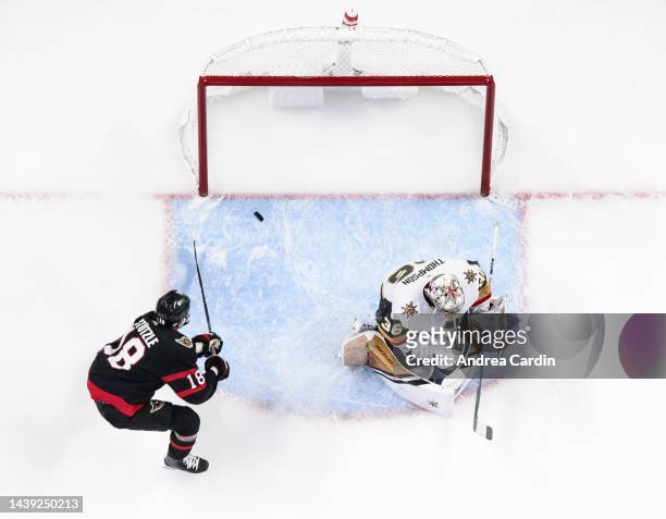 Tim Stützle of the Ottawa Senators scores a second period goal against Logan Thompson of the Vegas Golden Knights at Canadian Tire Centre on November...