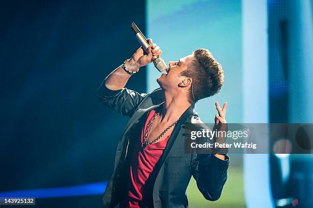 The 2012 winner of 'Deutschland Sucht Den Superstar', Luca Haenni, performs during DSDS Kids - 1st Show at Coloneum on May 05, 2012 in Cologne,...