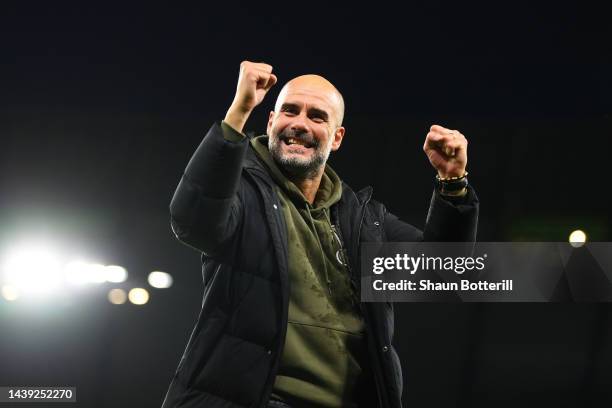 Pep Guardiola, Manager of Manchester City celebrates after their sides victory during the Premier League match between Manchester City and Fulham FC...