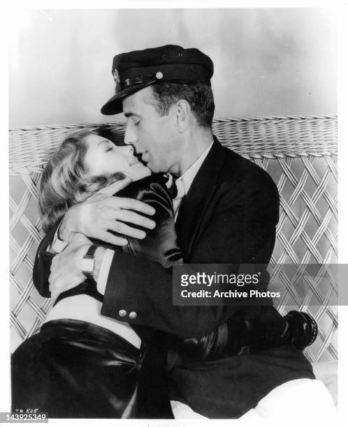 Lauren Bacall is embraced by Humphrey Bogart in a scene from the film 'To Have And Have Not', 1944.