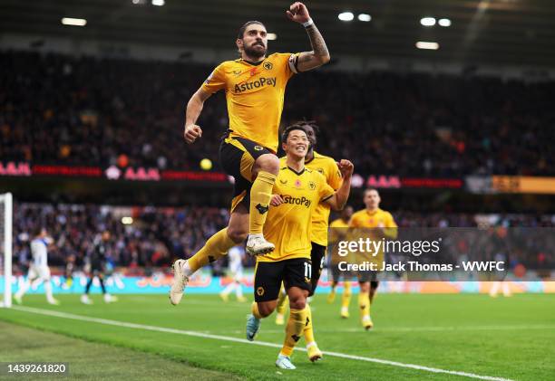 Ruben Neves of Wolverhampton Wanderers celebrates after scoring his team's second goal during the Premier League match between Wolverhampton...