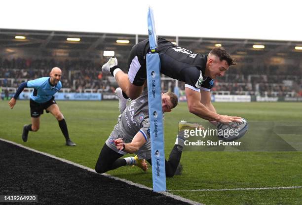 Falcons wing Adam Radwan dives over to score the opening try during the Gallagher Premiership Rugby match between Newcastle Falcons and Bath Rugby at...
