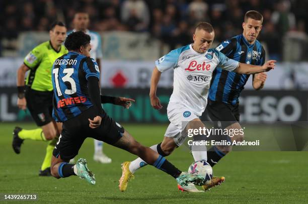 Stanislav Lobotka of SSC Napoli is challenged by Ederson of Atalanta BC during the Serie A match between Atalanta BC and SSC Napoli at Gewiss Stadium...