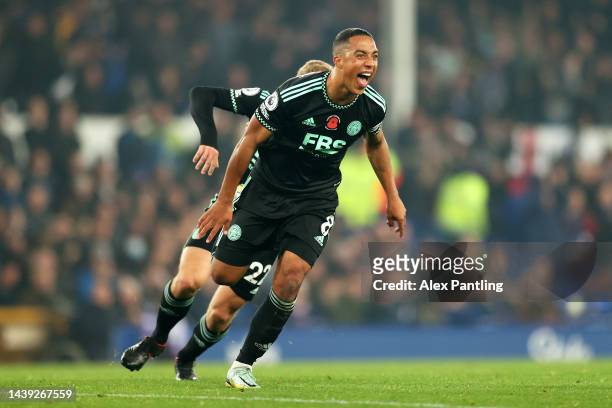 Youri Tielemans of Leicester City celebrates after scoring their team's first goal during the Premier League match between Everton FC and Leicester...