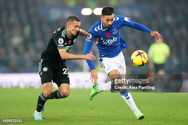 Dwight McNeil of Everton is challenged by Timothy Castagne of Leicester City during the Premier League match between Everton FC and Leicester City at...