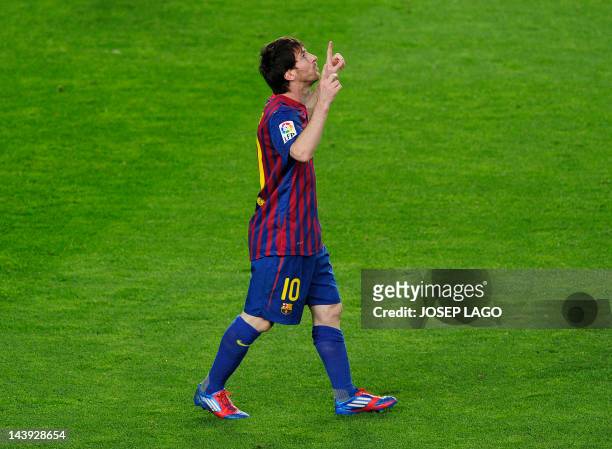 Barcelona's Argentinian forward Lionel Messi celebrates his goal during the Spanish League football match FC Barcelona vs RCD Espanyol at the Camp...