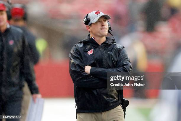 Head coach Jim Leonard of the Wisconsin Badgers looks on in the rain during the fourth quarter against the Maryland Terrapins at Camp Randall Stadium...