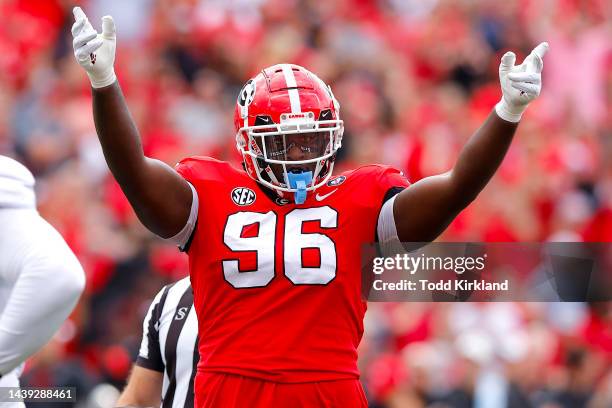 Zion Logue of the Georgia Bulldogs reacts after a play during the first quarter against the Tennessee Volunteers at Sanford Stadium on November 05,...
