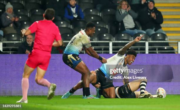 Kevin Naiqama of Fiji celebrates their sides third try during the Rugby League World Cup Quarter Final match between New Zealand and Fiji at MKM...