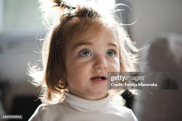 close up of a baby runny nose - slijm stockfoto's en -beelden